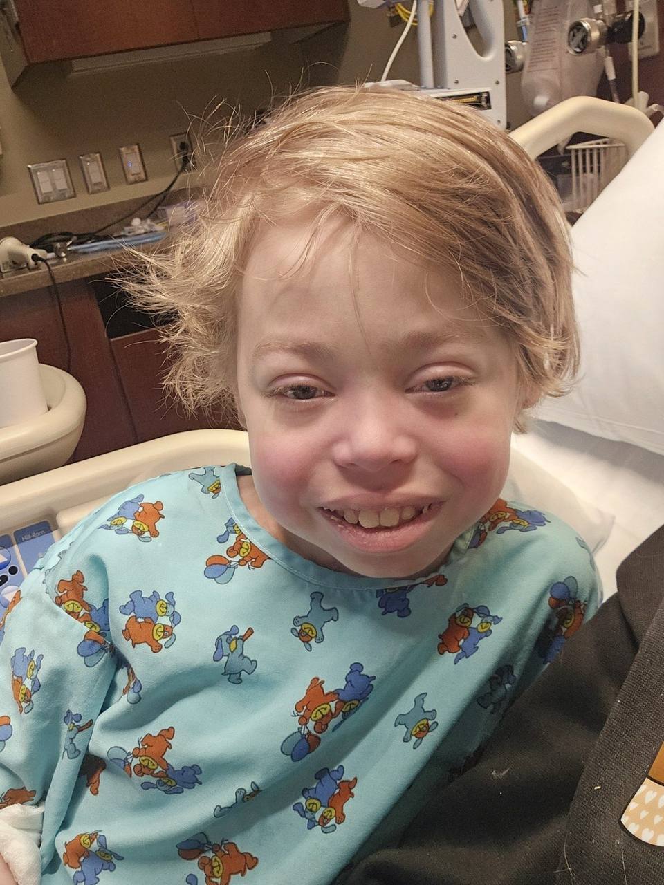 Aidenn smiling in the hospital